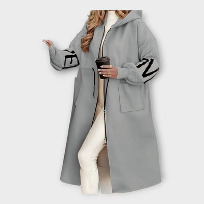 Κομψό Μακρύ Παλτό με Μοντέρνες Λεπτομέρειες
